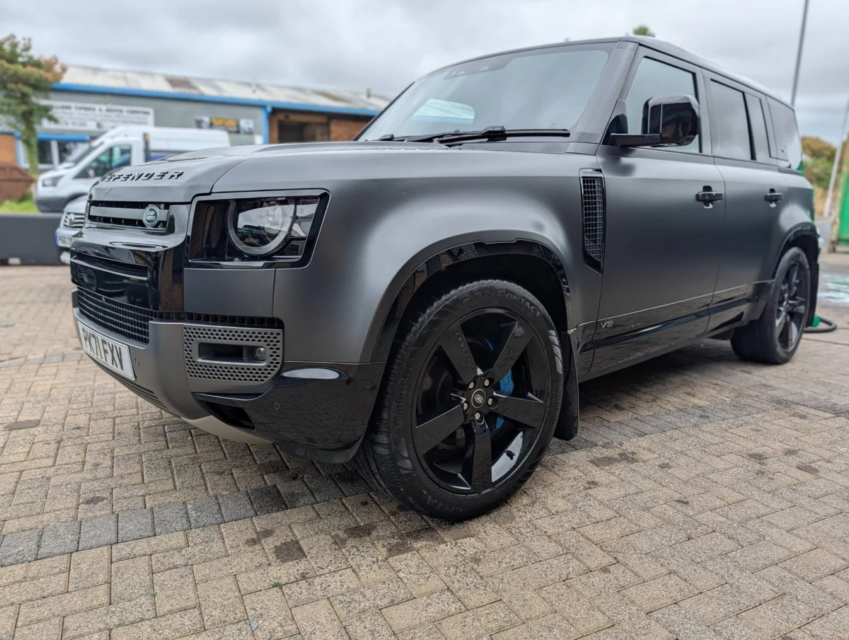 Grey Land Rover Defender after a detail