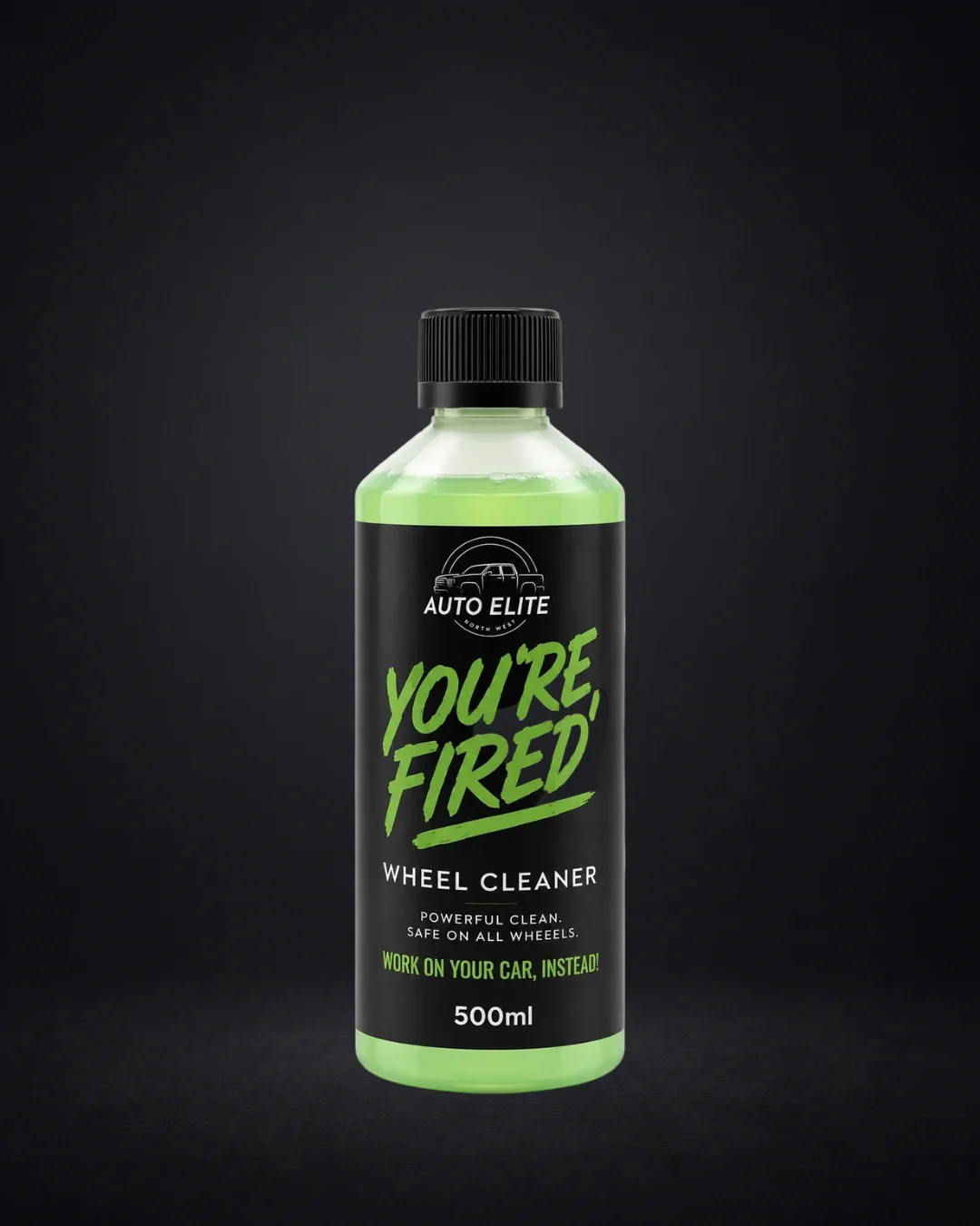 You're Fired wheel cleaner 500ml bottle with a screw cap, lit in a dark studio